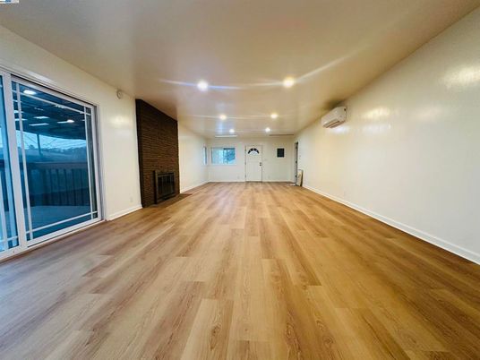Empty room, Fireplace, Interior, Recessed Lighting, Wood Texture Flooring