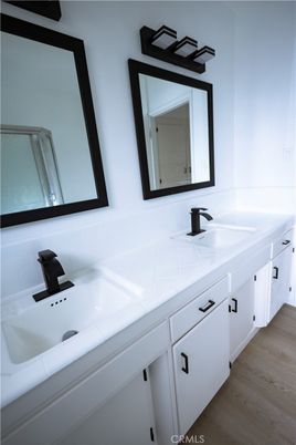 Bathroom, Dual Sink Vanities, Interior, Tile Countertops, Wood Texture Flooring