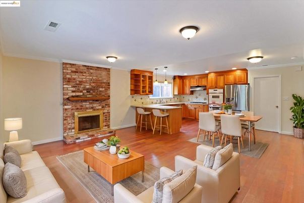 Dining room, Fireplace, Interior, Kitchen, Living room, Pendant Lights, Recessed Lighting, Stainless Steel Appliances, Stone Walls, Wood Texture Flooring