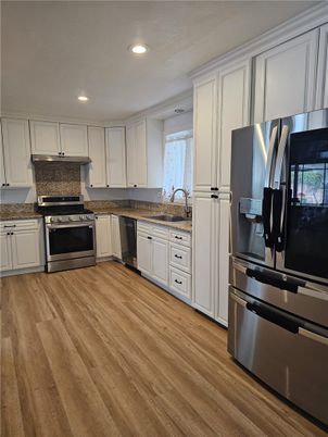 Interior, Kitchen, Recessed Lighting, Stainless Steel Appliances, Wood Texture Flooring