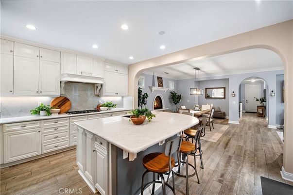 Dining room, Fireplace, Interior, Kitchen, Pendant Lights, Recessed Lighting, Wood Texture Flooring