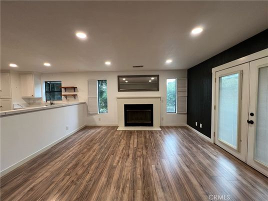 Empty room, Fireplace, Interior, Recessed Lighting, Wood Texture Flooring