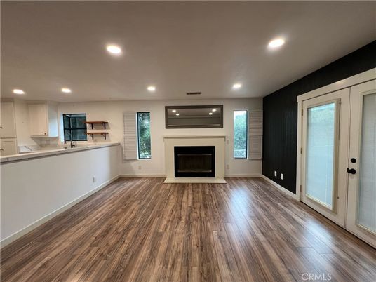 Empty room, Fireplace, Interior, Recessed Lighting, Wood Texture Flooring