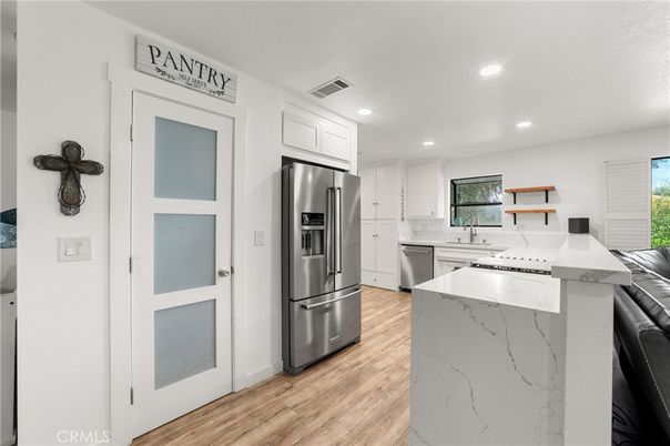 Interior, Kitchen, Recessed Lighting, Stainless Steel Appliances, Wood Texture Flooring