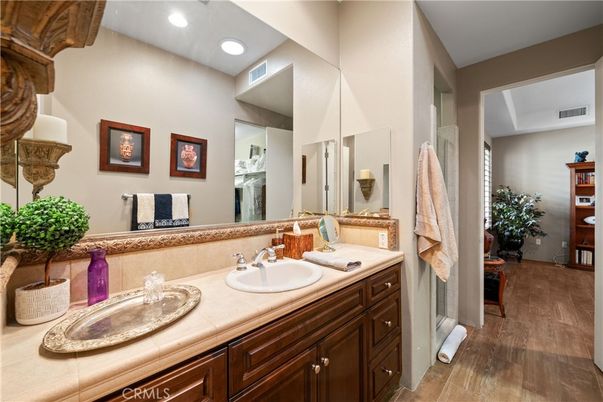 Bathroom, Dual Sink Vanities, Interior, Recessed Lighting, Tile Countertops, Wood Texture Flooring