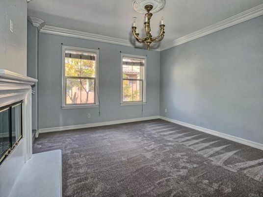 Chandelier, Empty room, Fireplace, Interior
