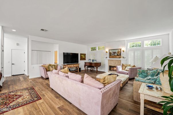Fireplace, Interior, Living room, Piano, Recessed Lighting, Wood Texture Flooring