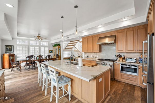 Dining room, Interior, Kitchen, Pendant Lights, Recessed Lighting, Stainless Steel Appliances, Wood Texture Flooring