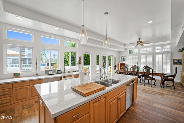 Dining room, Interior, Kitchen, Pendant Lights, Recessed Lighting, Stainless Steel Appliances, Wood Texture Flooring