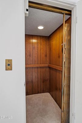 Elevator, Interior, Recessed Lighting, Wooden Walls