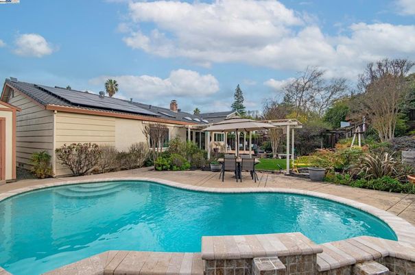 Exterior, Pool, Solar Panels