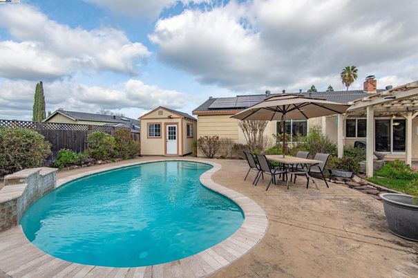 Exterior, Pool, Solar Panels