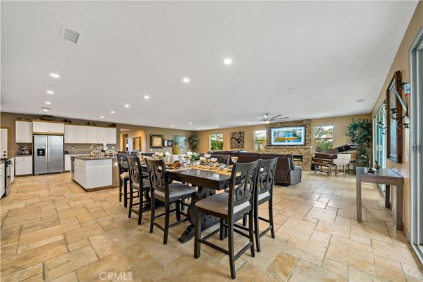 Dining room, Fireplace, Interior, Kitchen, Recessed Lighting, Stainless Steel Appliances, Stone Walls