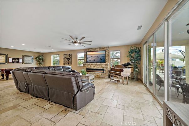 Fireplace, Interior, Living room, Piano, Recessed Lighting, Stone Walls