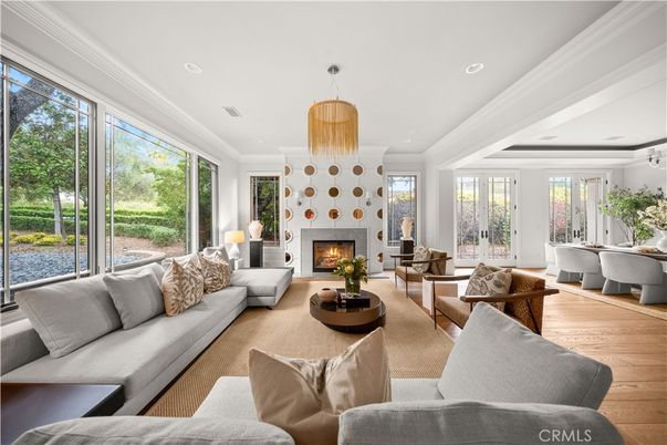 Dining room, Fireplace, Interior, Living room, Pendant Lights, Recessed Lighting, Wood Texture Flooring