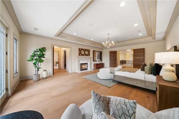 Chandelier, Fireplace, Interior, Living room, Recessed Lighting, Wood Texture Flooring