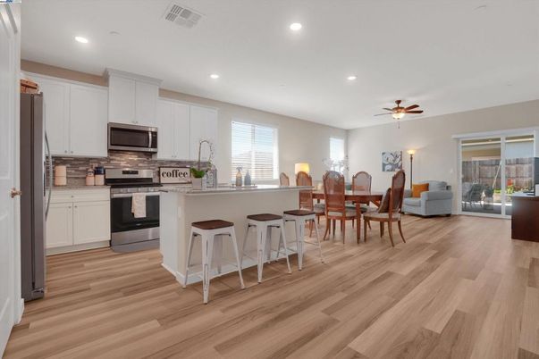 Dining room, Interior, Kitchen, Recessed Lighting, Stainless Steel Appliances, Wood Texture Flooring