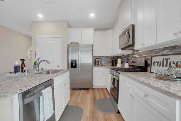 Interior, Kitchen, Recessed Lighting, Stainless Steel Appliances, Wood Texture Flooring
