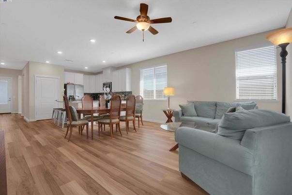 Dining room, Interior, Kitchen, Living room, Recessed Lighting, Stainless Steel Appliances, Wood Texture Flooring