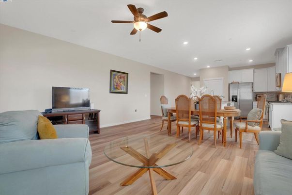 Dining room, Interior, Kitchen, Recessed Lighting, Stainless Steel Appliances, Wood Texture Flooring