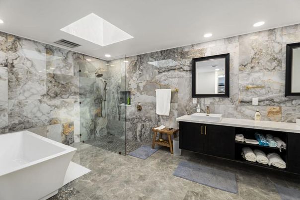 Bathroom, Dual Sink Vanities, Free Standing Baths, Glass Shower, Interior, Marble Walls, Recessed Lighting