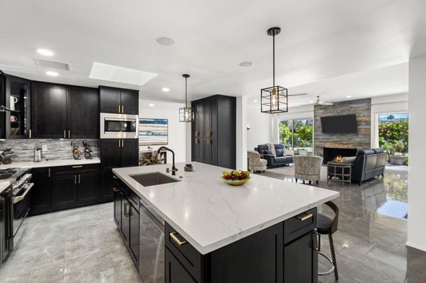 Fireplace, Interior, Kitchen, Living room, Pendant Lights, Recessed Lighting, Stainless Steel Appliances, Stone Walls