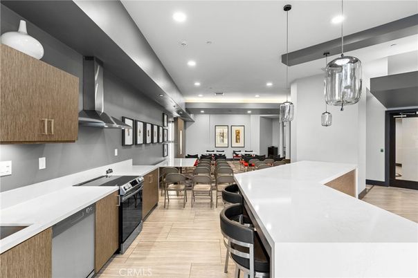 Dining room, Interior, Kitchen, Pendant Lights, Recessed Lighting, Stainless Steel Appliances, Wood Texture Flooring