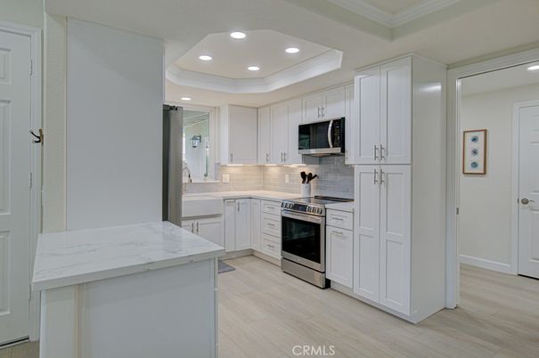 Interior, Kitchen, Recessed Lighting, Stainless Steel Appliances, Wood Texture Flooring