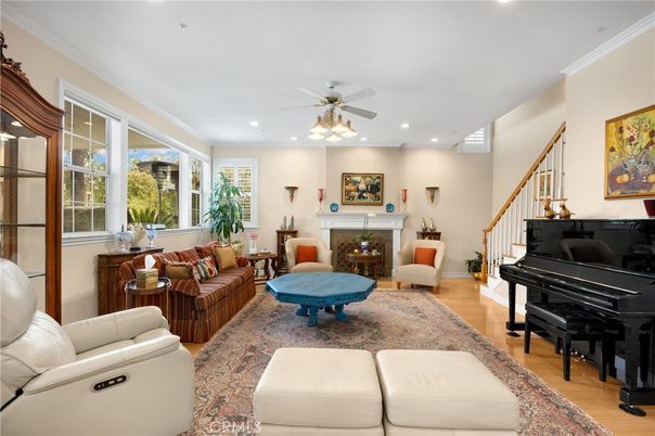 Fireplace, Interior, Living room, Piano, Recessed Lighting, Wood Texture Flooring