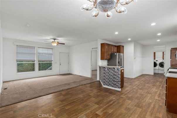 Empty room, Interior, Kitchen, Recessed Lighting, Washer, Wood Texture Flooring