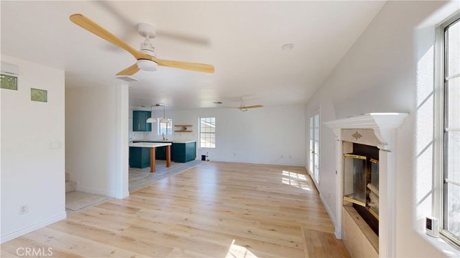 Empty room, Fireplace, Interior, Kitchen, Pendant Lights, Wood Texture Flooring