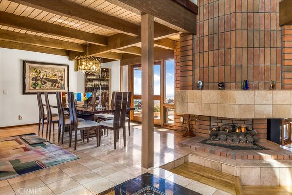 Chandelier, Dining room, Fireplace, Interior, Wooden Beams