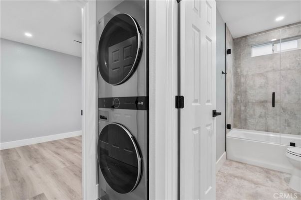 Bathroom, Interior, Recessed Lighting, Utility Closets, Washer, Wood Texture Flooring