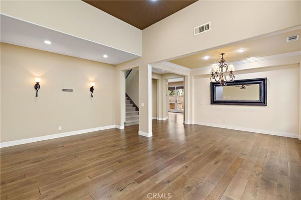 Chandelier, Empty room, Interior, Recessed Lighting, Wood Texture Flooring