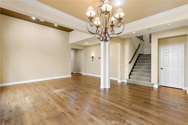 Chandelier, Empty room, Interior, Recessed Lighting, Wood Texture Flooring