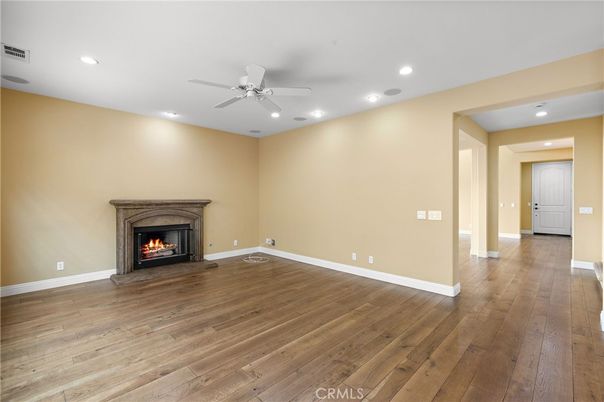 Empty room, Fireplace, Interior, Recessed Lighting, Wood Texture Flooring