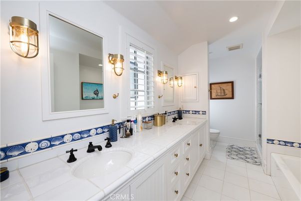 Bathroom, Dual Sink Vanities, Interior, Recessed Lighting, Tile Countertops