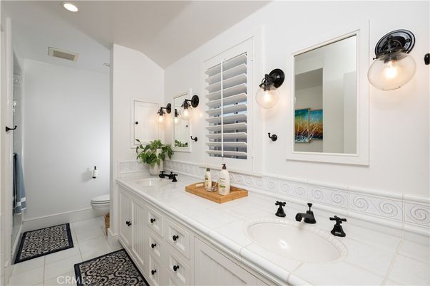 Bathroom, Dual Sink Vanities, Interior, Recessed Lighting, Tile Countertops