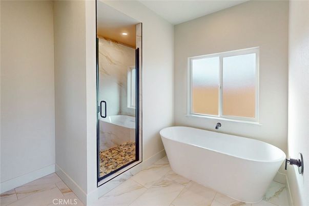 Bathroom, Free Standing Baths, Interior, Marble, Marble Walls, Recessed Lighting
