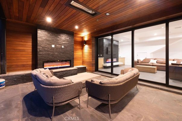 Fireplace, Interior, Living room, Recessed Lighting, Stone Walls, Wooden Ceilings, Wooden Walls
