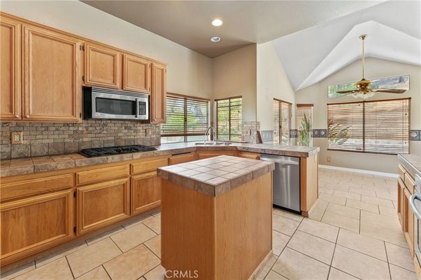 Interior, Kitchen, Recessed Lighting, Stainless Steel Appliances, Tile Countertops