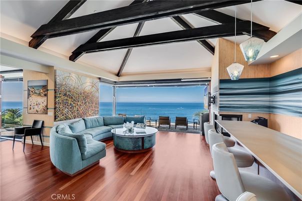 Dining room, Interior, Living room, Pendant Lights, Recessed Lighting, Water, Wooden Beams, Wood Texture Flooring