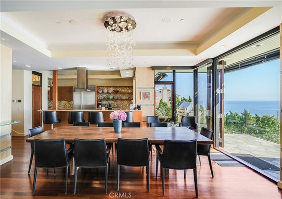 Chandelier, Dining room, Interior, Kitchen, Pendant Lights, Recessed Lighting, Stainless Steel Appliances, Water, Wood Texture Flooring