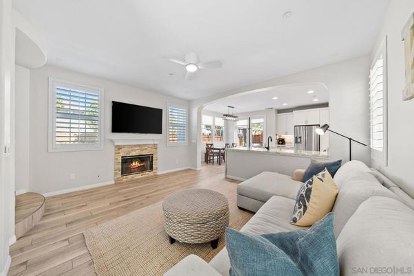 Chandelier, Dining room, Fireplace, Interior, Kitchen, Living room, Pendant Lights, Recessed Lighting, Wood Texture Flooring