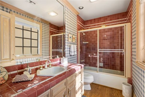 Bathroom, Glass Shower, Interior, Recessed Lighting, Tile Countertops, Wood Texture Flooring