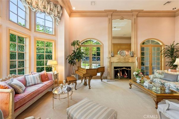 Chandelier, Fireplace, Interior, Living room, Piano, Recessed Lighting