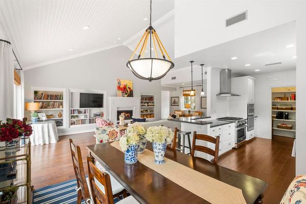 Dining room, Fireplace, Interior, Kitchen, Living room, Pendant Lights, Recessed Lighting, Stainless Steel Appliances, Wood Texture Flooring