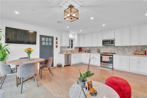 Dining room, Interior, Kitchen, Recessed Lighting, Stainless Steel Appliances, Wood Texture Flooring