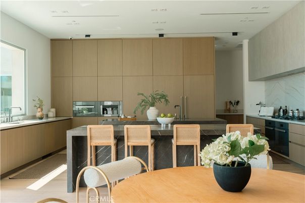 Interior, Kitchen, Marble Walls, Recessed Lighting, Stainless Steel Appliances, Wood Texture Flooring