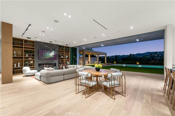 Dining room, Fireplace, Interior, Living room, Recessed Lighting, Wood Texture Flooring